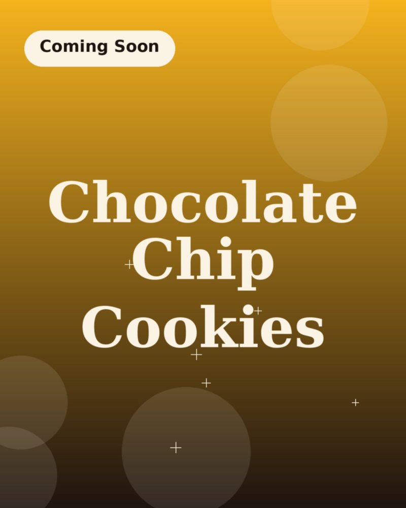 Homemade chocolate chip cookies with crackled tops cooling on a rack